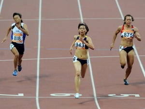 Vũ Thị Hương đã mang về đoàn thể thao Việt Nam chiếc huy chương đồng ở nội dung chạy 100 mét. (Ảnh: Quốc Khánh/TTXVN).